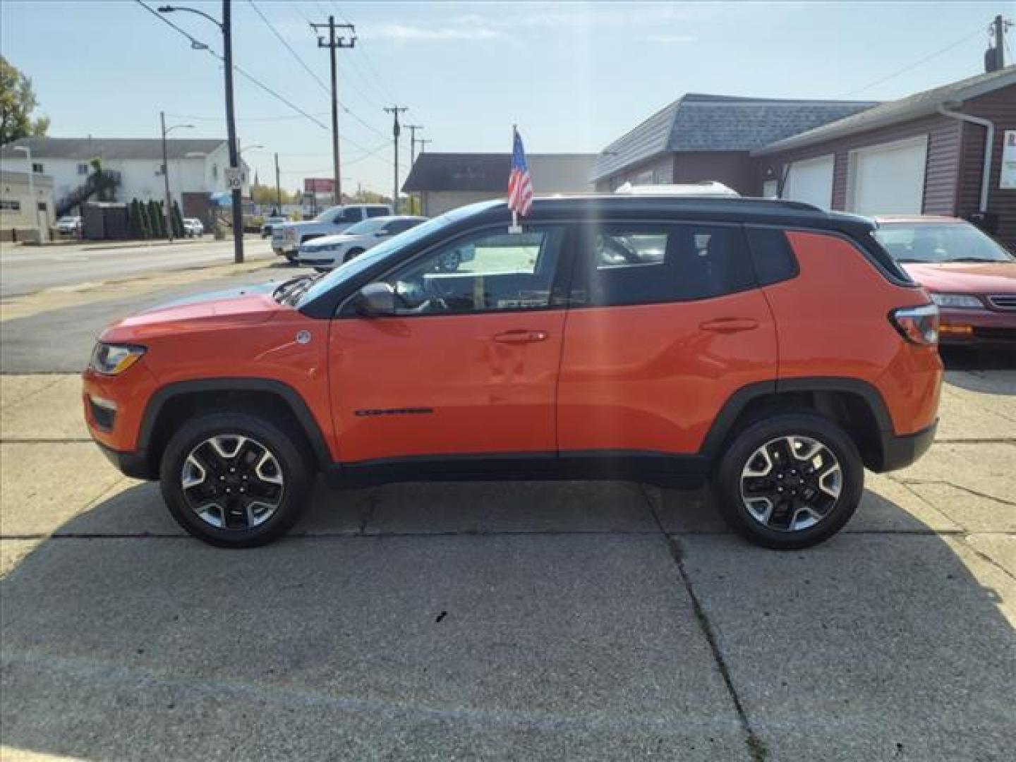 2018 Spitfire Orange Clear Coat Jeep Compass 4x4 Trailhawk (3C4NJDDB4JT) with an 2.4L Tigershark 2.4L I4 180hp 175ft. lbs. Sequential Multiport Fuel Injection engine, 9-Speed Shiftable Automatic transmission, located at 5505 N. Summit St., Toledo, OH, 43611, (419) 729-2688, 41.654953, -83.530014 - Photo#21