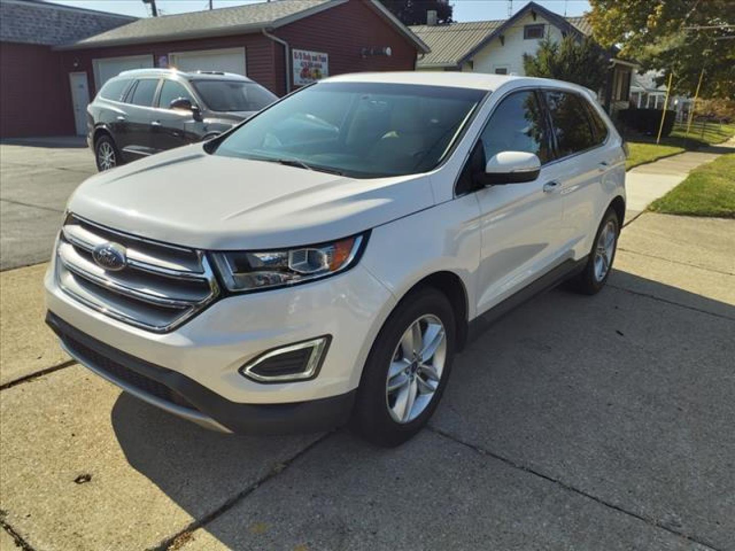 2016 Oxford White Ford Edge SEL (2FMPK3J98GB) with an 2.0L EcoBoost 2.0L Turbo I4 245hp 275ft. lbs. Direct Injection engine, 6-Speed Shiftable Automatic transmission, located at 5505 N. Summit St., Toledo, OH, 43611, (419) 729-2688, 41.654953, -83.530014 - Photo#22