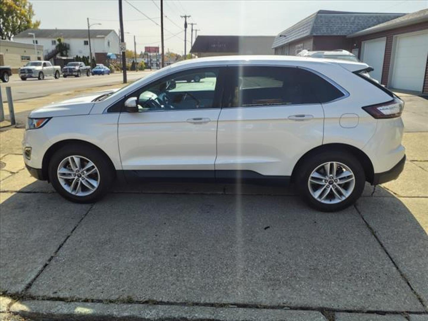 2016 Oxford White Ford Edge SEL (2FMPK3J98GB) with an 2.0L EcoBoost 2.0L Turbo I4 245hp 275ft. lbs. Direct Injection engine, 6-Speed Shiftable Automatic transmission, located at 5505 N. Summit St., Toledo, OH, 43611, (419) 729-2688, 41.654953, -83.530014 - Photo#23