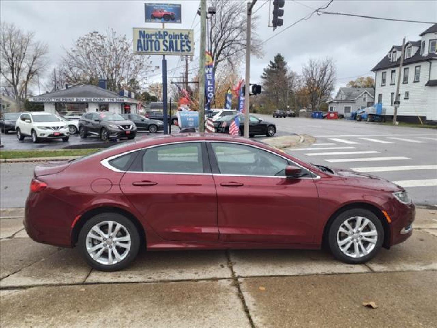 2015 Velvet Red Pearl Coat Prv Chrysler 200 Limited (1C3CCCAB3FN) with an 2.4L 2.4L I4 184hp 173ft. lbs. Sequential Multiport Fuel Injection engine, 9-Speed Shiftable Automatic transmission, located at 5505 N. Summit St., Toledo, OH, 43611, (419) 729-2688, 41.654953, -83.530014 - Photo#0