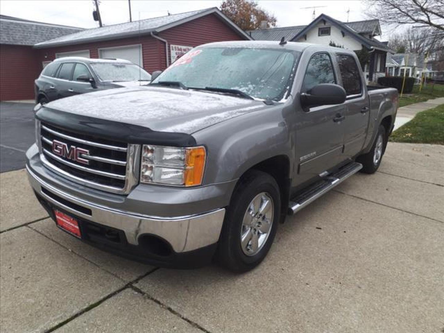 2013 Steel Gray Metallic 16u GMC Sierra 1500 4x4 SLE (3GTP2VEA8DG) with an 4.8L Vortec 4.8L Flex Fuel V8 302hp 305ft. lbs. Sequential-Port F.I. engine, 4-Speed Automatic transmission, located at 5505 N. Summit St., Toledo, OH, 43611, (419) 729-2688, 41.654953, -83.530014 - Photo#16