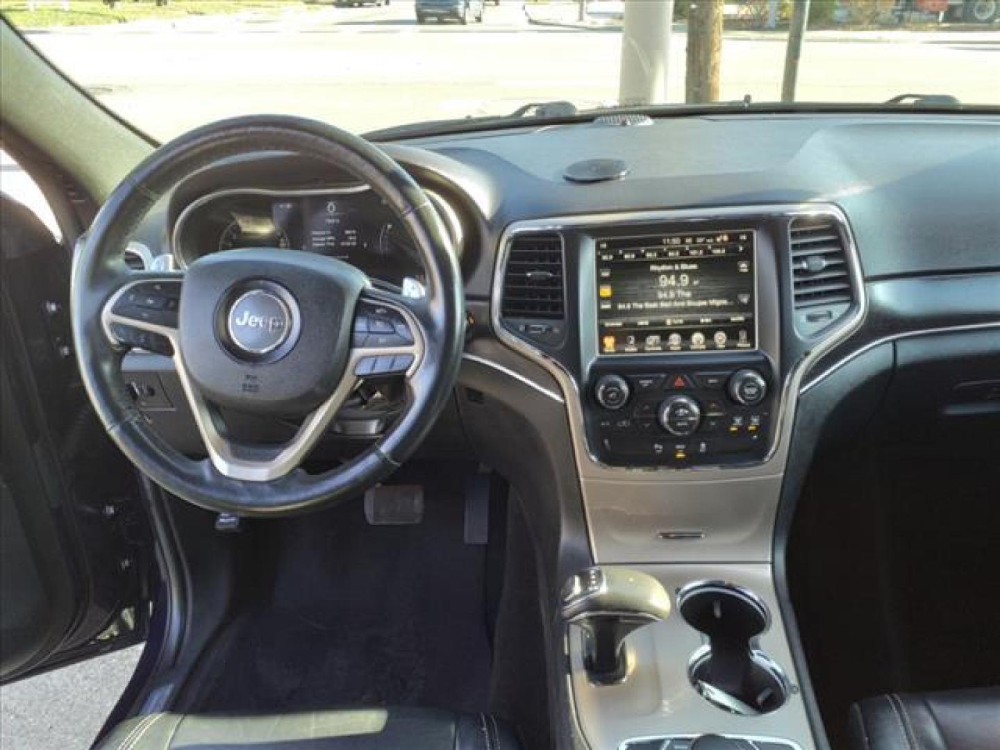 2014 True Blue Pearl Coat Pbu Jeep Grand Cherokee 4x4 Limited (1C4RJFBG4EC) with an 3.6L 3.6L V6 290hp 260ft. lbs. Sequential Multiport Fuel Injection engine, 8-Speed Shiftable Automatic transmission, located at 5505 N. Summit St., Toledo, OH, 43611, (419) 729-2688, 41.654953, -83.530014 - Photo#4