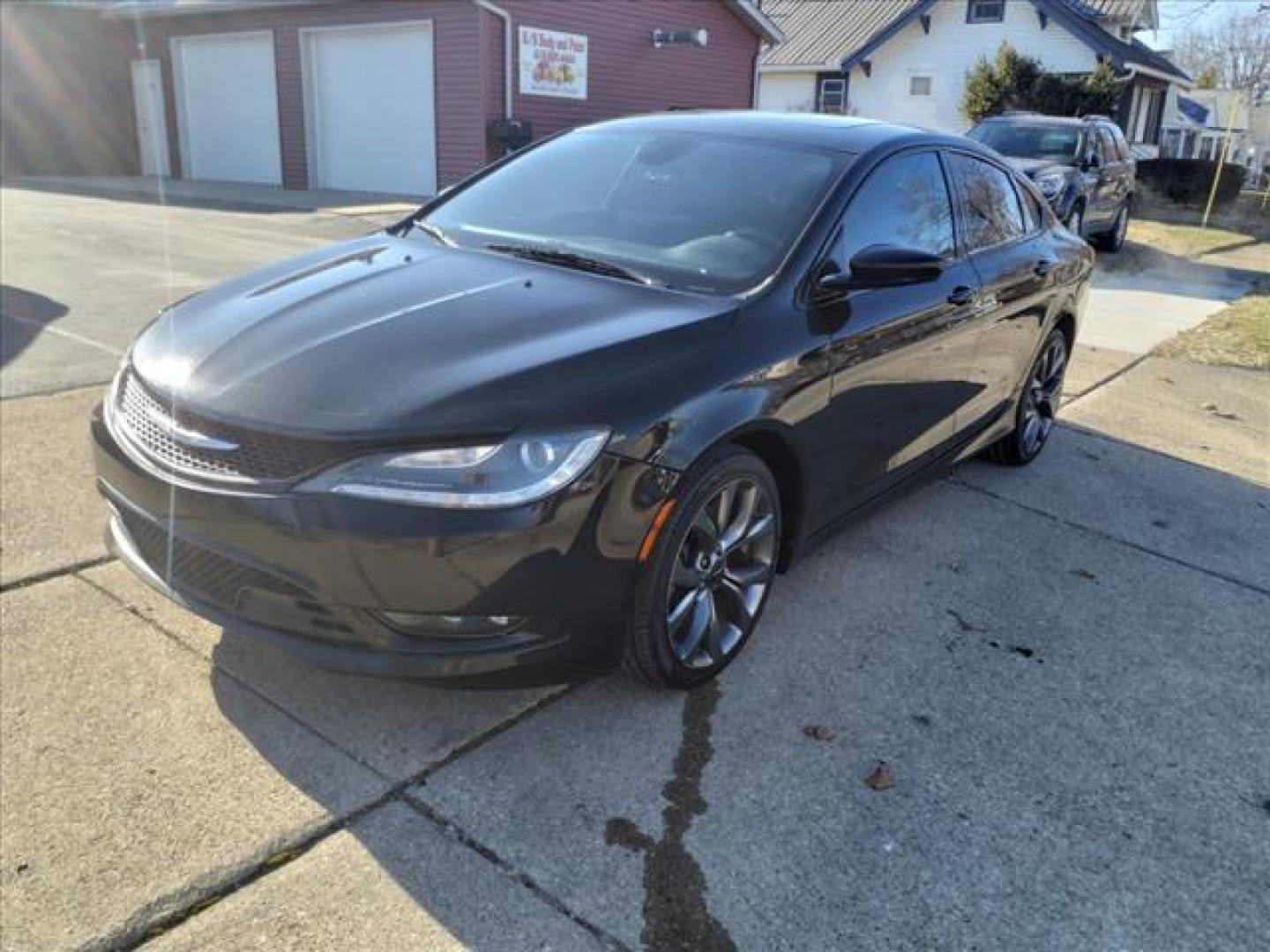 2015 Black Clear Coat Px8 Chrysler 200 AWD S (1C3CCCDG4FN) with an 3.6L 3.6L V6 295hp 262ft. lbs. Sequential Multiport Fuel Injection engine, 9-Speed Shiftable Automatic transmission, located at 5505 N. Summit St., Toledo, OH, 43611, (419) 729-2688, 41.654953, -83.530014 - Photo#22