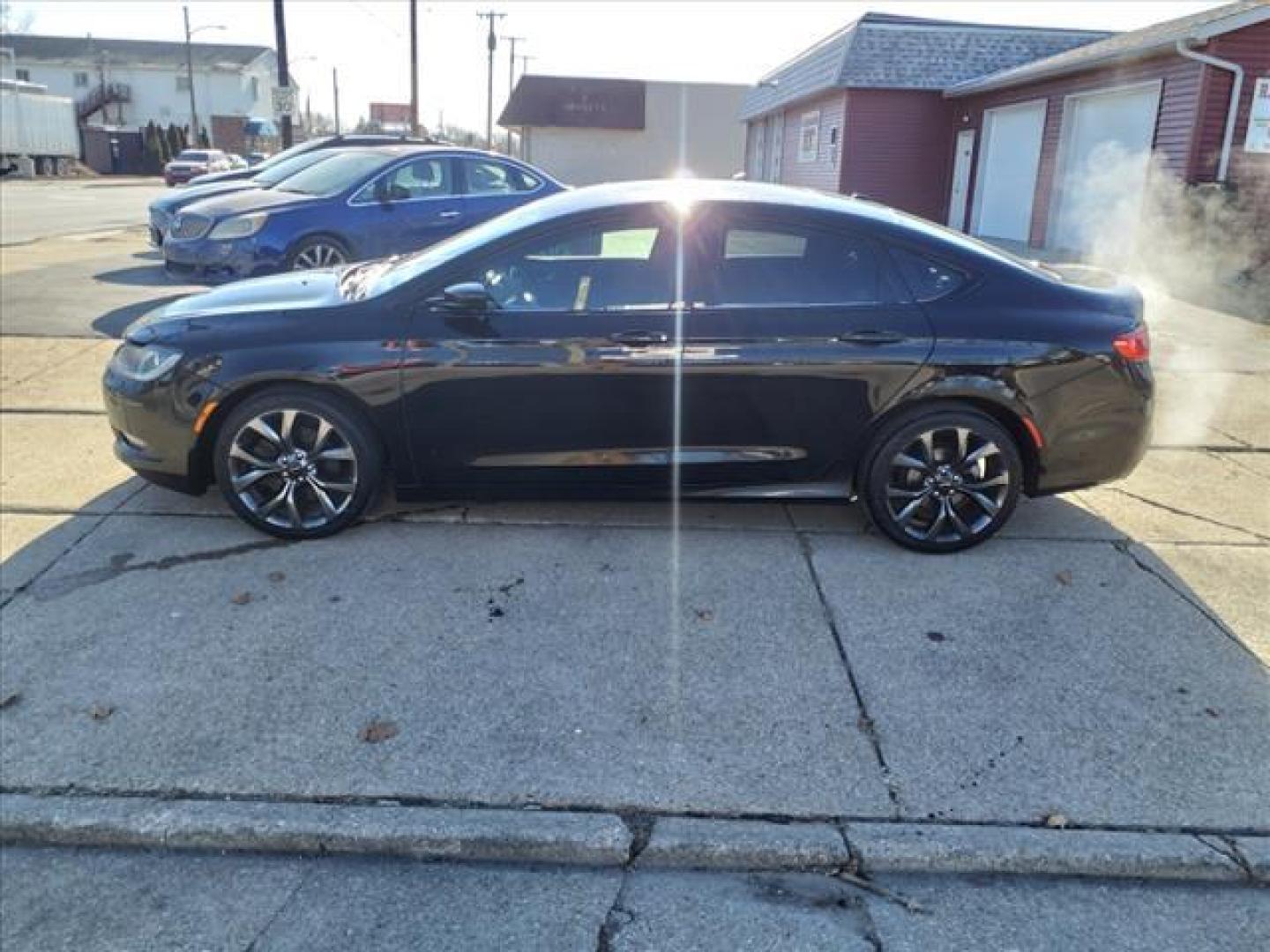 2015 Black Clear Coat Px8 Chrysler 200 AWD S (1C3CCCDG4FN) with an 3.6L 3.6L V6 295hp 262ft. lbs. Sequential Multiport Fuel Injection engine, 9-Speed Shiftable Automatic transmission, located at 5505 N. Summit St., Toledo, OH, 43611, (419) 729-2688, 41.654953, -83.530014 - Photo#23