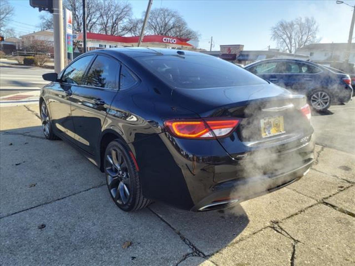 2015 Black Clear Coat Px8 Chrysler 200 AWD S (1C3CCCDG4FN) with an 3.6L 3.6L V6 295hp 262ft. lbs. Sequential Multiport Fuel Injection engine, 9-Speed Shiftable Automatic transmission, located at 5505 N. Summit St., Toledo, OH, 43611, (419) 729-2688, 41.654953, -83.530014 - Photo#24