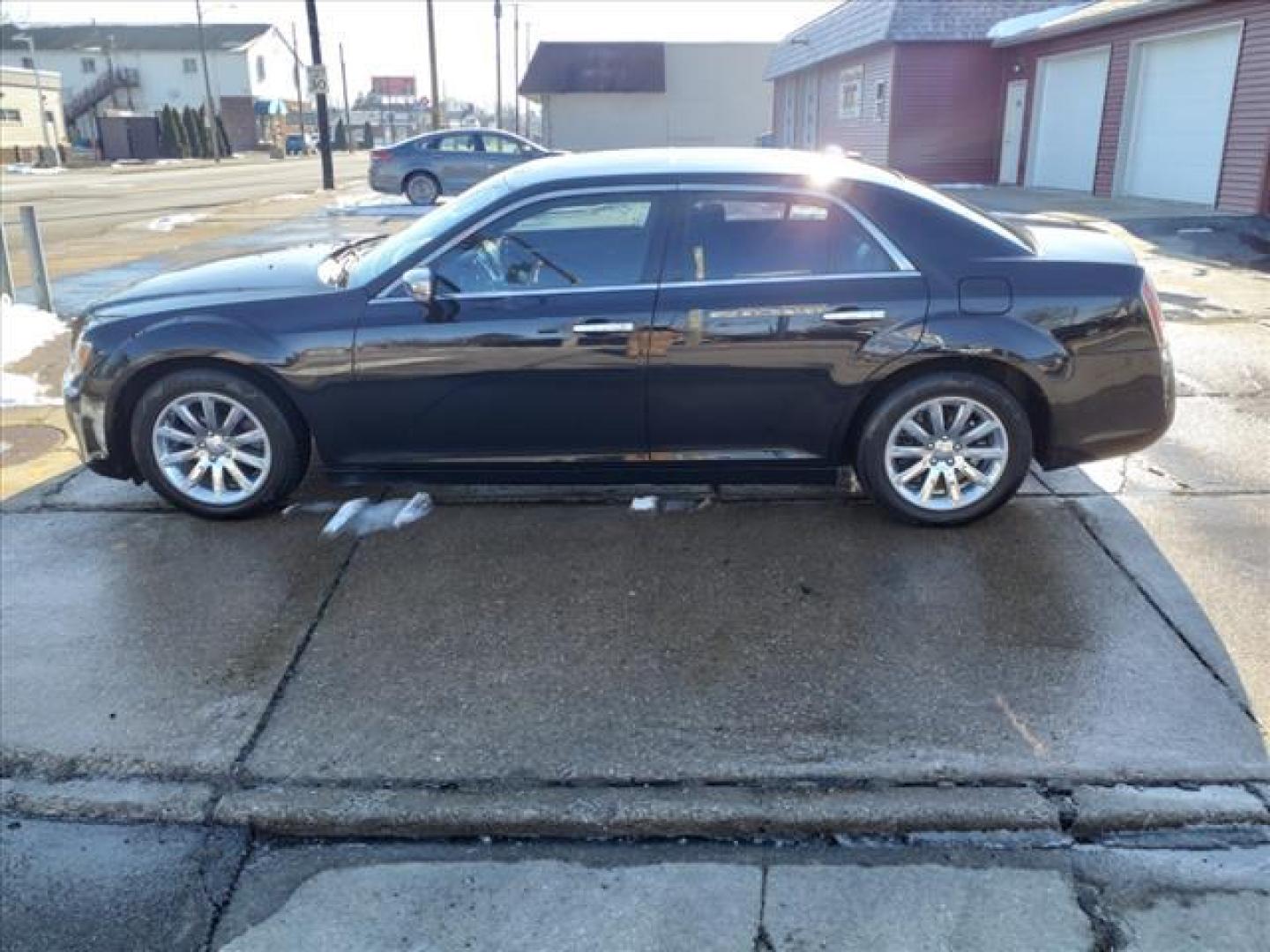 2013 Gloss Black Px8 Chrysler 300 C (2C3CCAEG3DH) with an 3.6L Pentastar 3.6L V6 292hp 260ft. lbs. Sequential Multiport Fuel Injection engine, Automatic transmission, located at 5505 N. Summit St., Toledo, OH, 43611, (419) 729-2688, 41.654953, -83.530014 - Photo#23