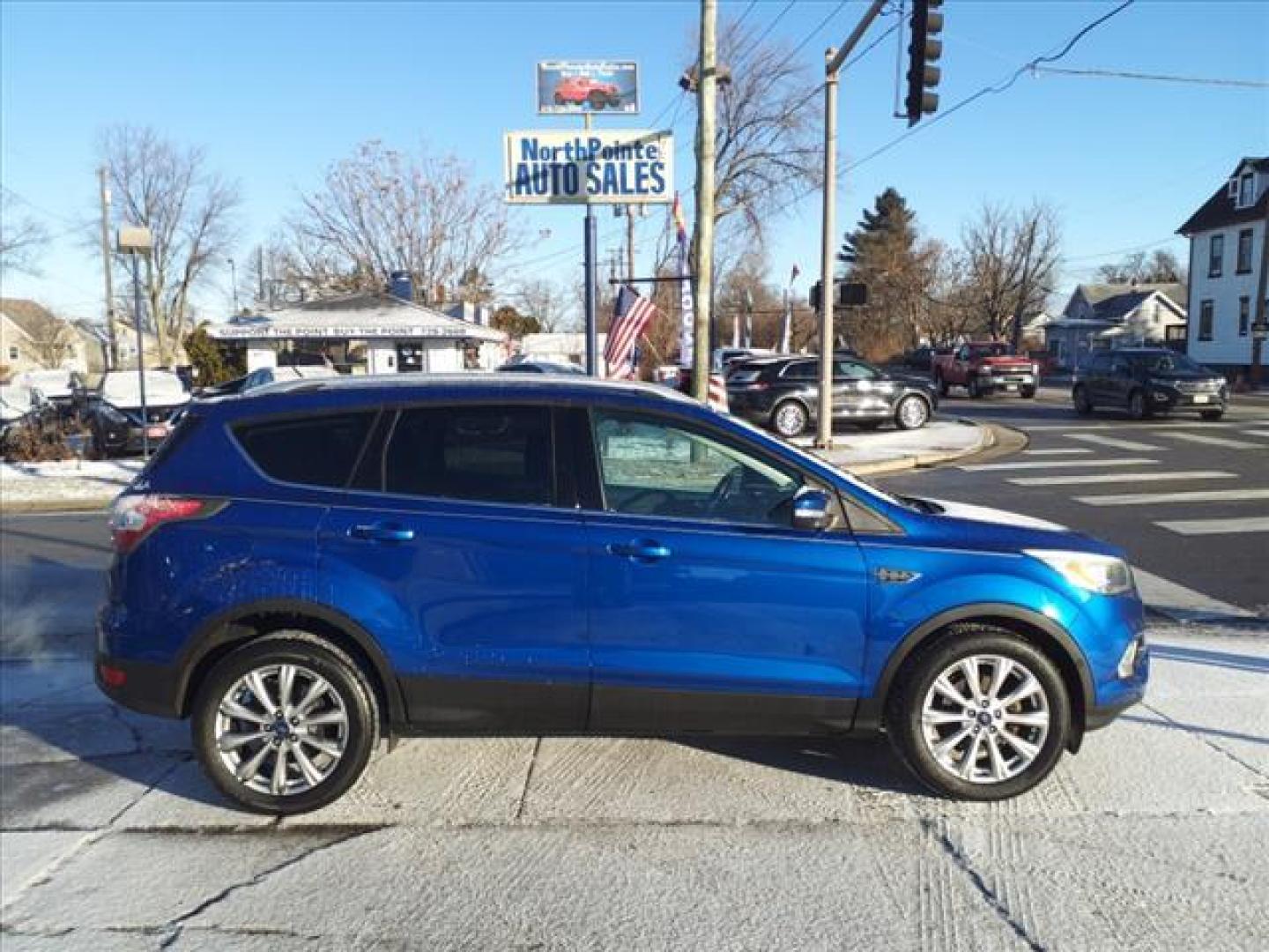 2017 Lightning Blue N6 Ford Escape Titanium (1FMCU0JDXHU) with an 1.5L EcoBoost 1.5L Turbo I4 179hp 177ft. lbs. Direct Injection engine, 6-Speed Shiftable Automatic transmission, located at 5505 N. Summit St., Toledo, OH, 43611, (419) 729-2688, 41.654953, -83.530014 - Photo#0