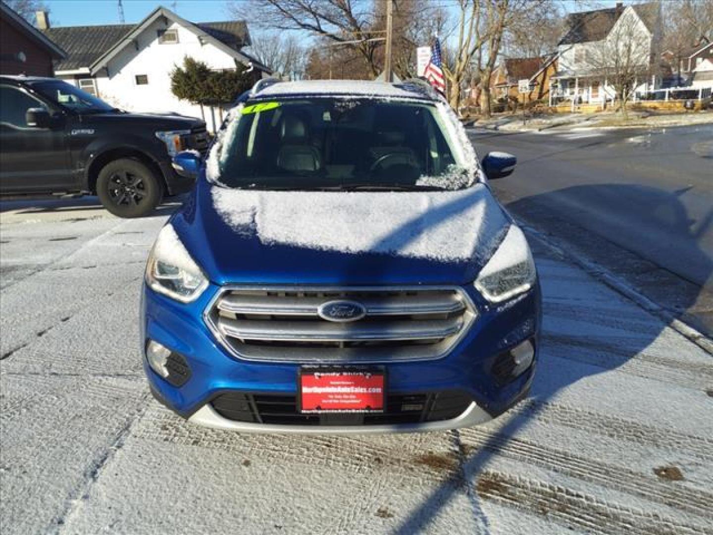 2017 Lightning Blue N6 Ford Escape Titanium (1FMCU0JDXHU) with an 1.5L EcoBoost 1.5L Turbo I4 179hp 177ft. lbs. Direct Injection engine, 6-Speed Shiftable Automatic transmission, located at 5505 N. Summit St., Toledo, OH, 43611, (419) 729-2688, 41.654953, -83.530014 - Photo#19