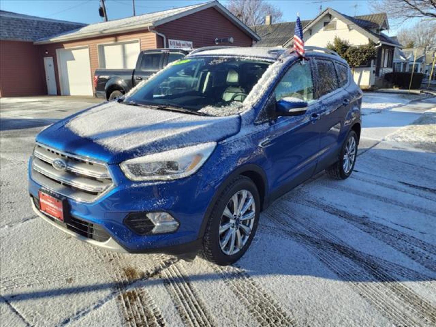 2017 Lightning Blue N6 Ford Escape Titanium (1FMCU0JDXHU) with an 1.5L EcoBoost 1.5L Turbo I4 179hp 177ft. lbs. Direct Injection engine, 6-Speed Shiftable Automatic transmission, located at 5505 N. Summit St., Toledo, OH, 43611, (419) 729-2688, 41.654953, -83.530014 - Photo#20