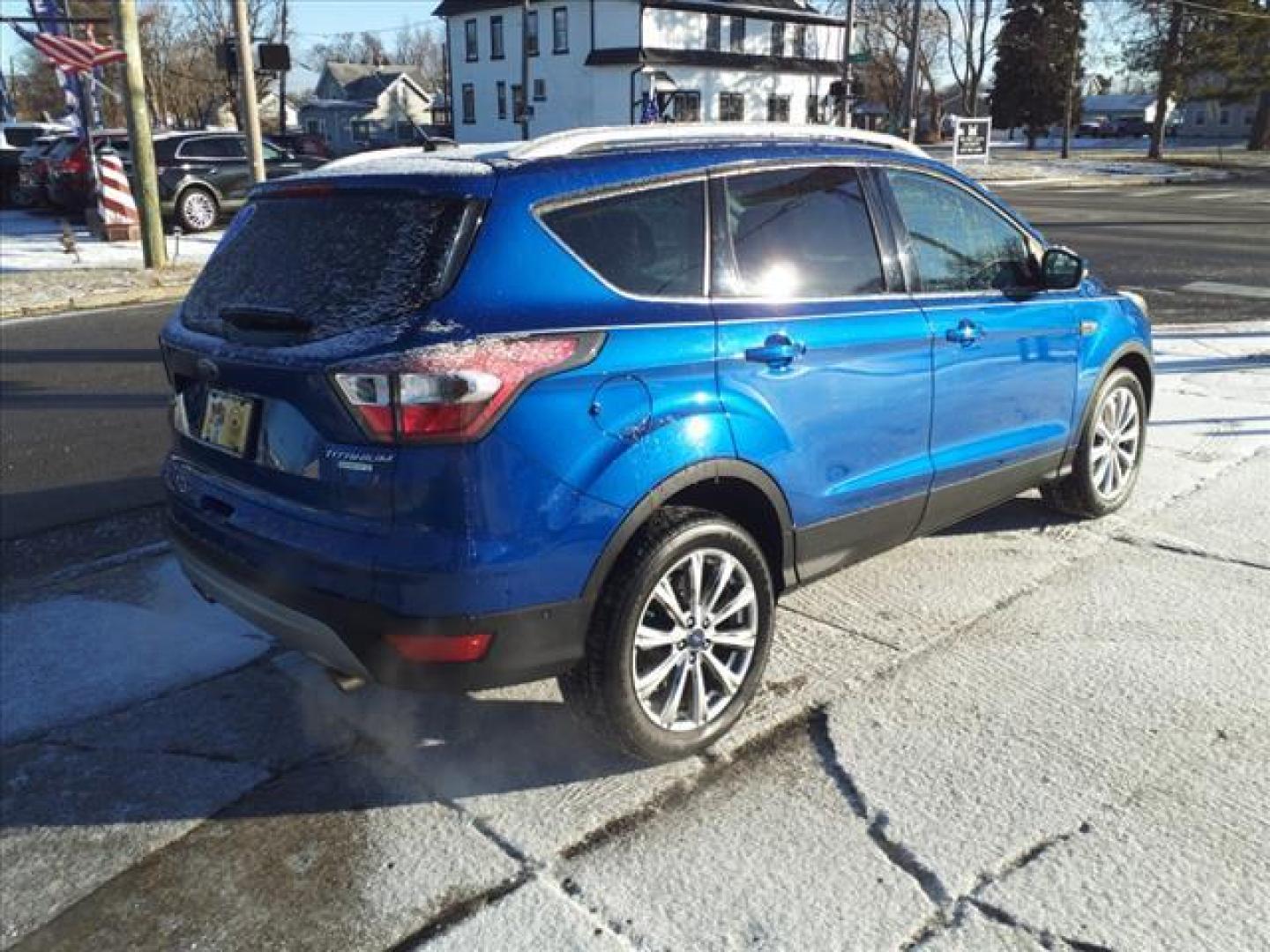 2017 Lightning Blue N6 Ford Escape Titanium (1FMCU0JDXHU) with an 1.5L EcoBoost 1.5L Turbo I4 179hp 177ft. lbs. Direct Injection engine, 6-Speed Shiftable Automatic transmission, located at 5505 N. Summit St., Toledo, OH, 43611, (419) 729-2688, 41.654953, -83.530014 - Photo#24