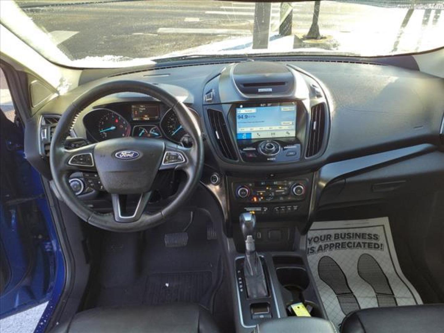 2017 Lightning Blue N6 Ford Escape Titanium (1FMCU0JDXHU) with an 1.5L EcoBoost 1.5L Turbo I4 179hp 177ft. lbs. Direct Injection engine, 6-Speed Shiftable Automatic transmission, located at 5505 N. Summit St., Toledo, OH, 43611, (419) 729-2688, 41.654953, -83.530014 - Photo#4