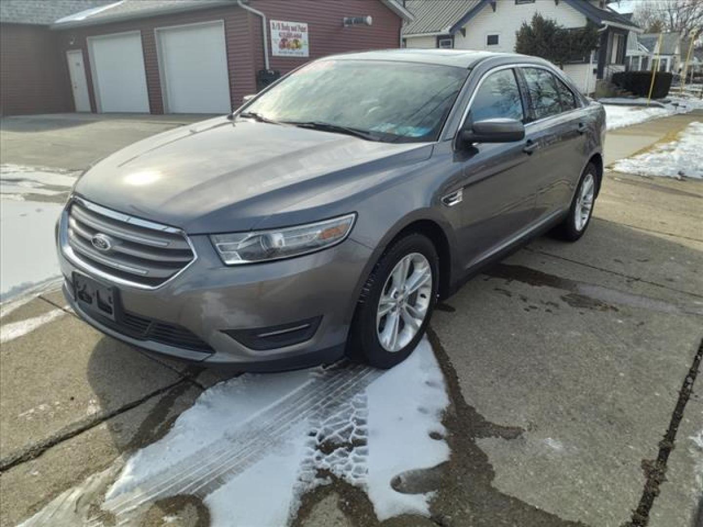 2014 Sterling Gray Metallic Uj Ford Taurus SEL (1FAHP2E88EG) with an 3.5L 3.5L V6 288hp 254ft. lbs. Sequential Multiport Fuel Injection engine, 6-Speed Shiftable Automatic transmission, located at 5505 N. Summit St., Toledo, OH, 43611, (419) 729-2688, 41.654953, -83.530014 - Photo#19