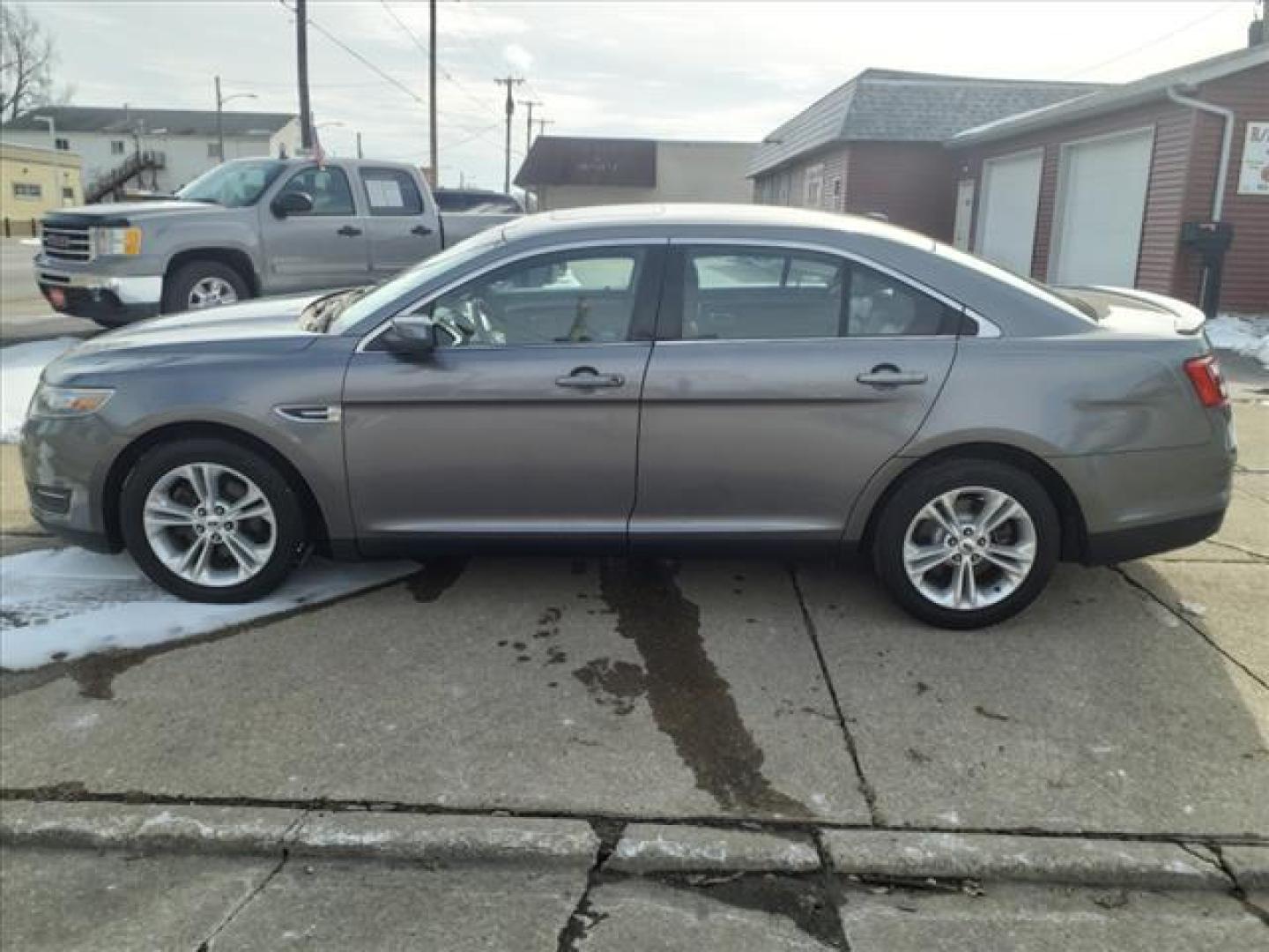 2014 Sterling Gray Metallic Uj Ford Taurus SEL (1FAHP2E88EG) with an 3.5L 3.5L V6 288hp 254ft. lbs. Sequential Multiport Fuel Injection engine, 6-Speed Shiftable Automatic transmission, located at 5505 N. Summit St., Toledo, OH, 43611, (419) 729-2688, 41.654953, -83.530014 - Photo#20