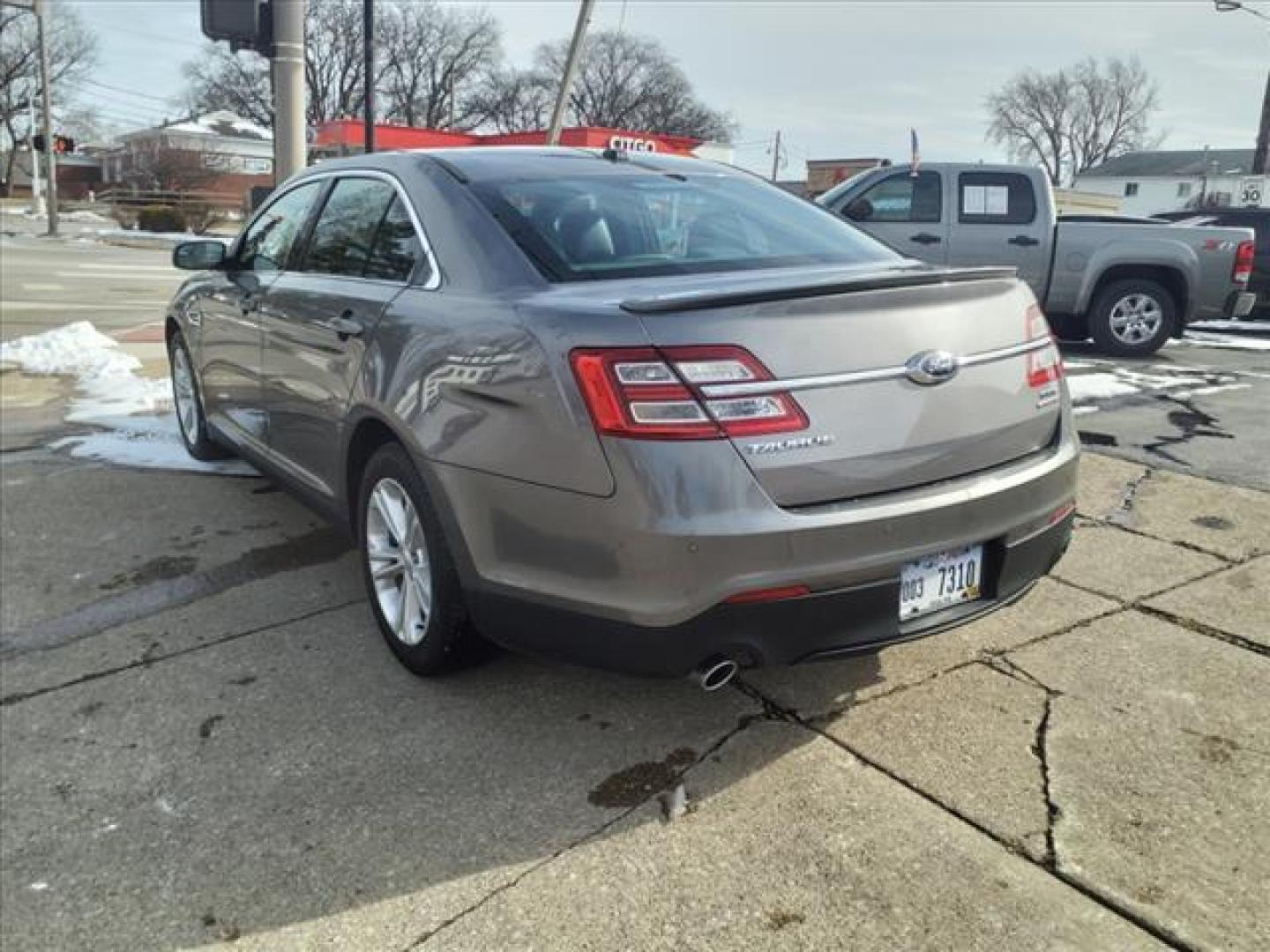 2014 Sterling Gray Metallic Uj Ford Taurus SEL (1FAHP2E88EG) with an 3.5L 3.5L V6 288hp 254ft. lbs. Sequential Multiport Fuel Injection engine, 6-Speed Shiftable Automatic transmission, located at 5505 N. Summit St., Toledo, OH, 43611, (419) 729-2688, 41.654953, -83.530014 - Photo#21