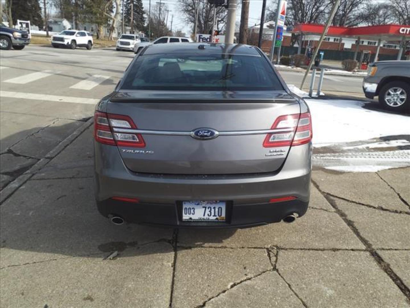 2014 Sterling Gray Metallic Uj Ford Taurus SEL (1FAHP2E88EG) with an 3.5L 3.5L V6 288hp 254ft. lbs. Sequential Multiport Fuel Injection engine, 6-Speed Shiftable Automatic transmission, located at 5505 N. Summit St., Toledo, OH, 43611, (419) 729-2688, 41.654953, -83.530014 - Photo#22