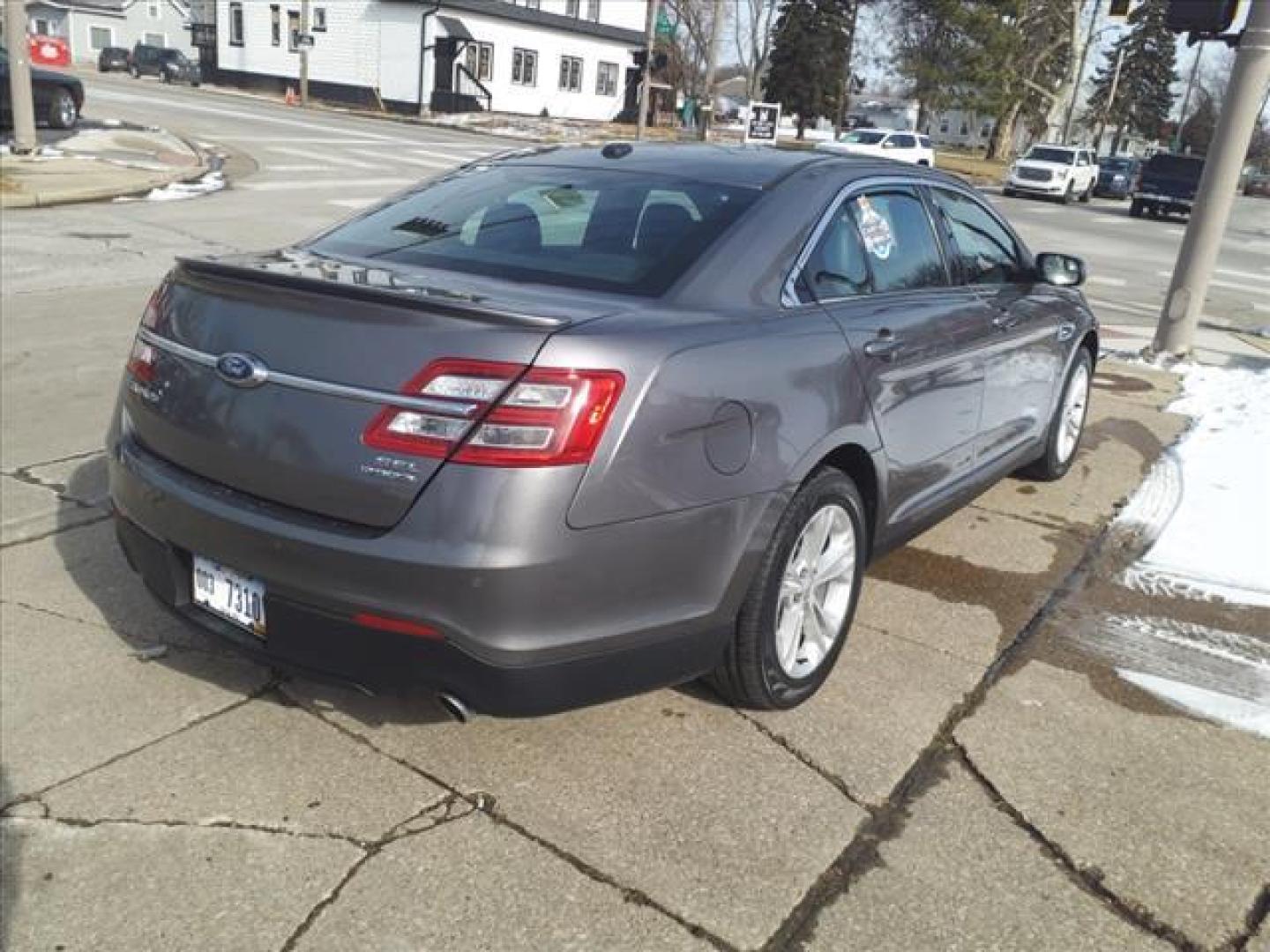 2014 Sterling Gray Metallic Uj Ford Taurus SEL (1FAHP2E88EG) with an 3.5L 3.5L V6 288hp 254ft. lbs. Sequential Multiport Fuel Injection engine, 6-Speed Shiftable Automatic transmission, located at 5505 N. Summit St., Toledo, OH, 43611, (419) 729-2688, 41.654953, -83.530014 - Photo#23