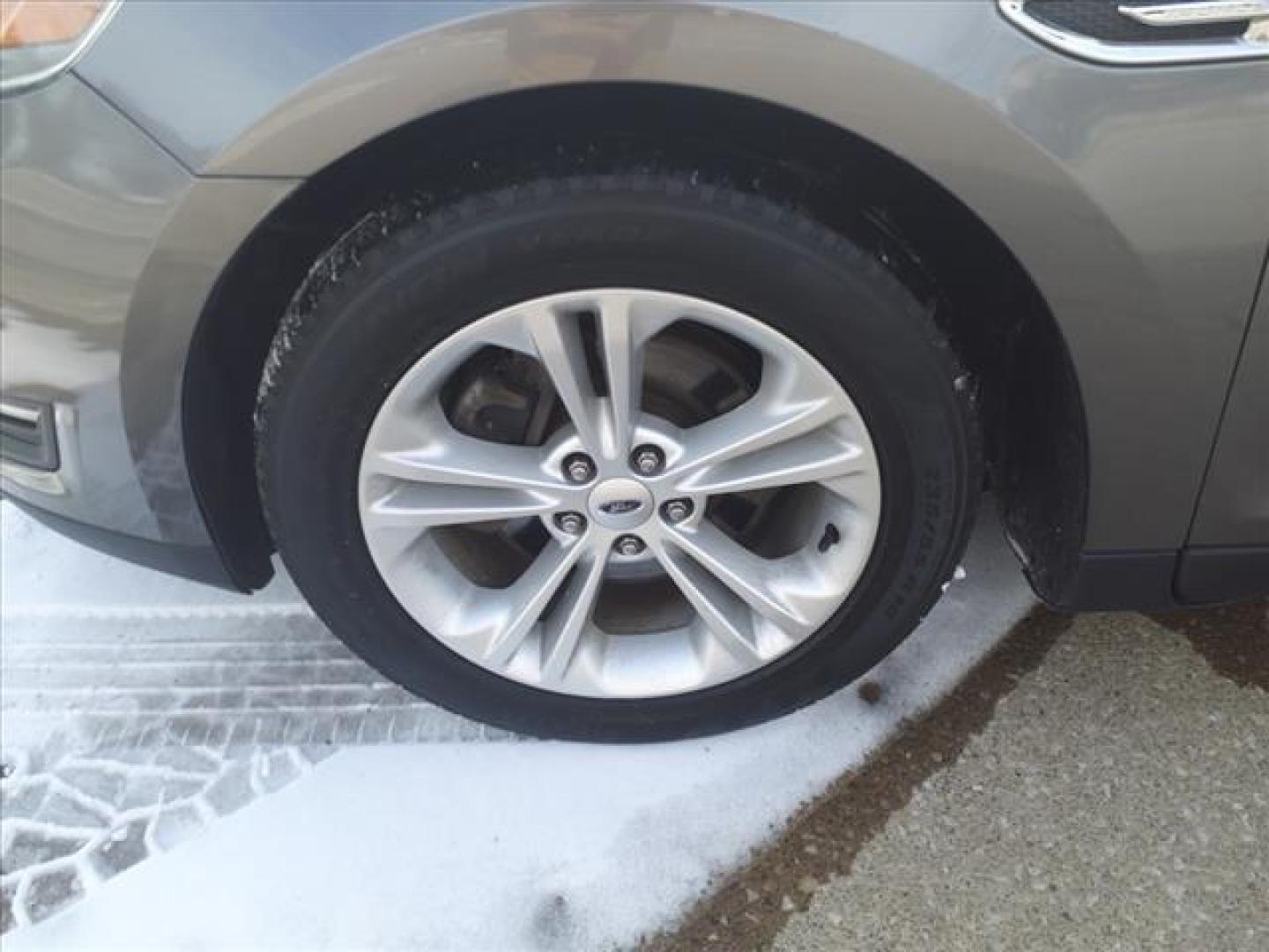 2014 Sterling Gray Metallic Uj Ford Taurus SEL (1FAHP2E88EG) with an 3.5L 3.5L V6 288hp 254ft. lbs. Sequential Multiport Fuel Injection engine, 6-Speed Shiftable Automatic transmission, located at 5505 N. Summit St., Toledo, OH, 43611, (419) 729-2688, 41.654953, -83.530014 - Photo#26